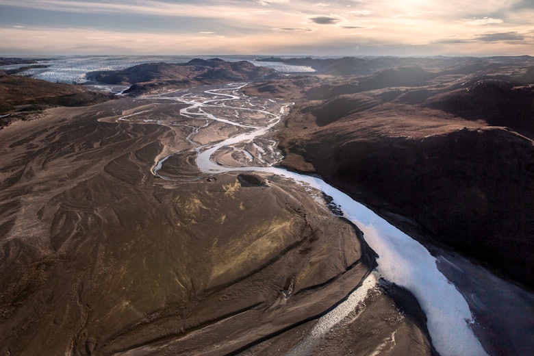 A meltwater river in Kangerlussuaq seen from an Air Zafari flight in Greenland Mads Pihl and Air Zafari and Visit Greenland