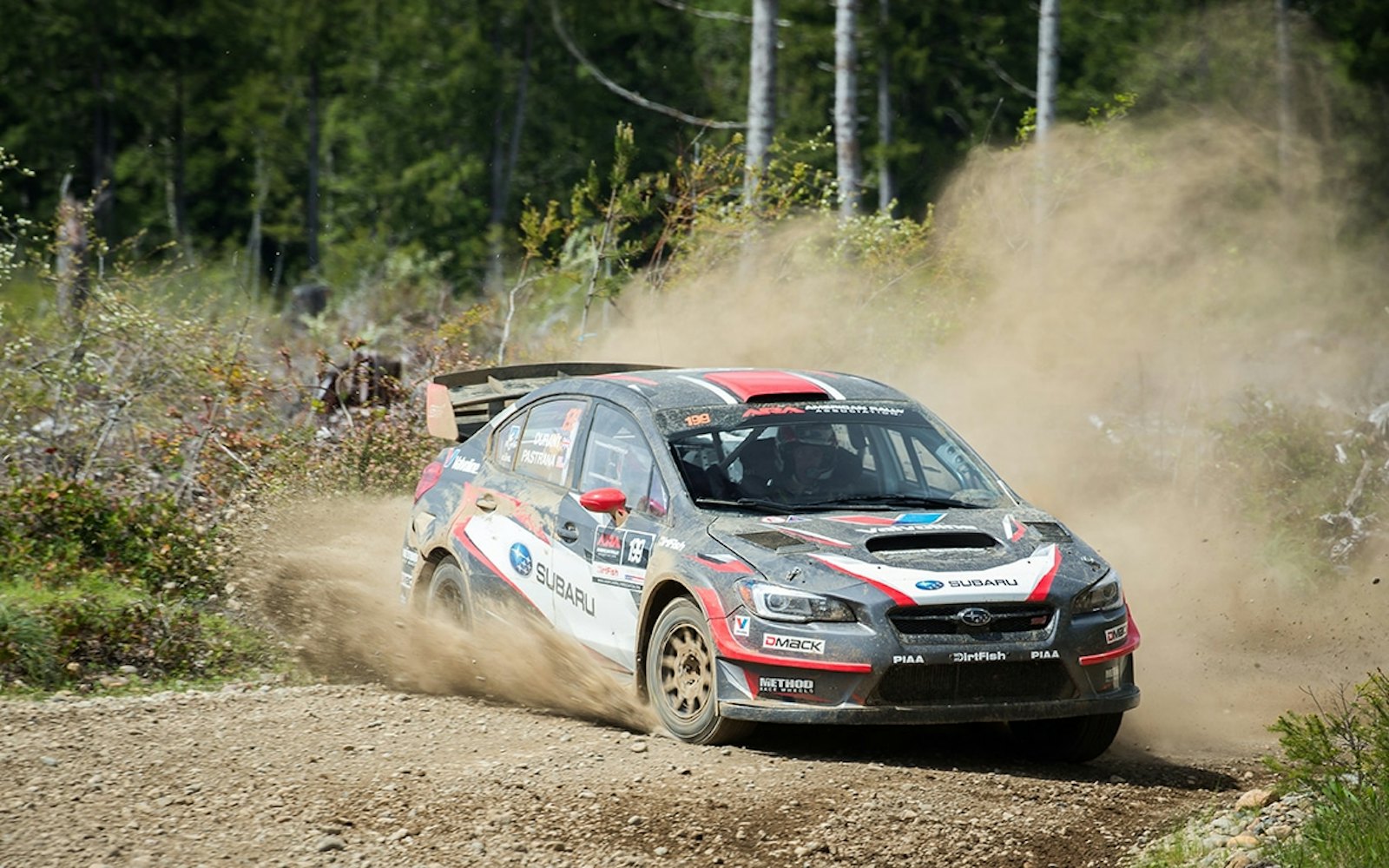 Travis_Pastrana_and_codriver_Robbie_Durant_finished_2nd_to_teammate_Higgins_at_the_Olympus_Rally